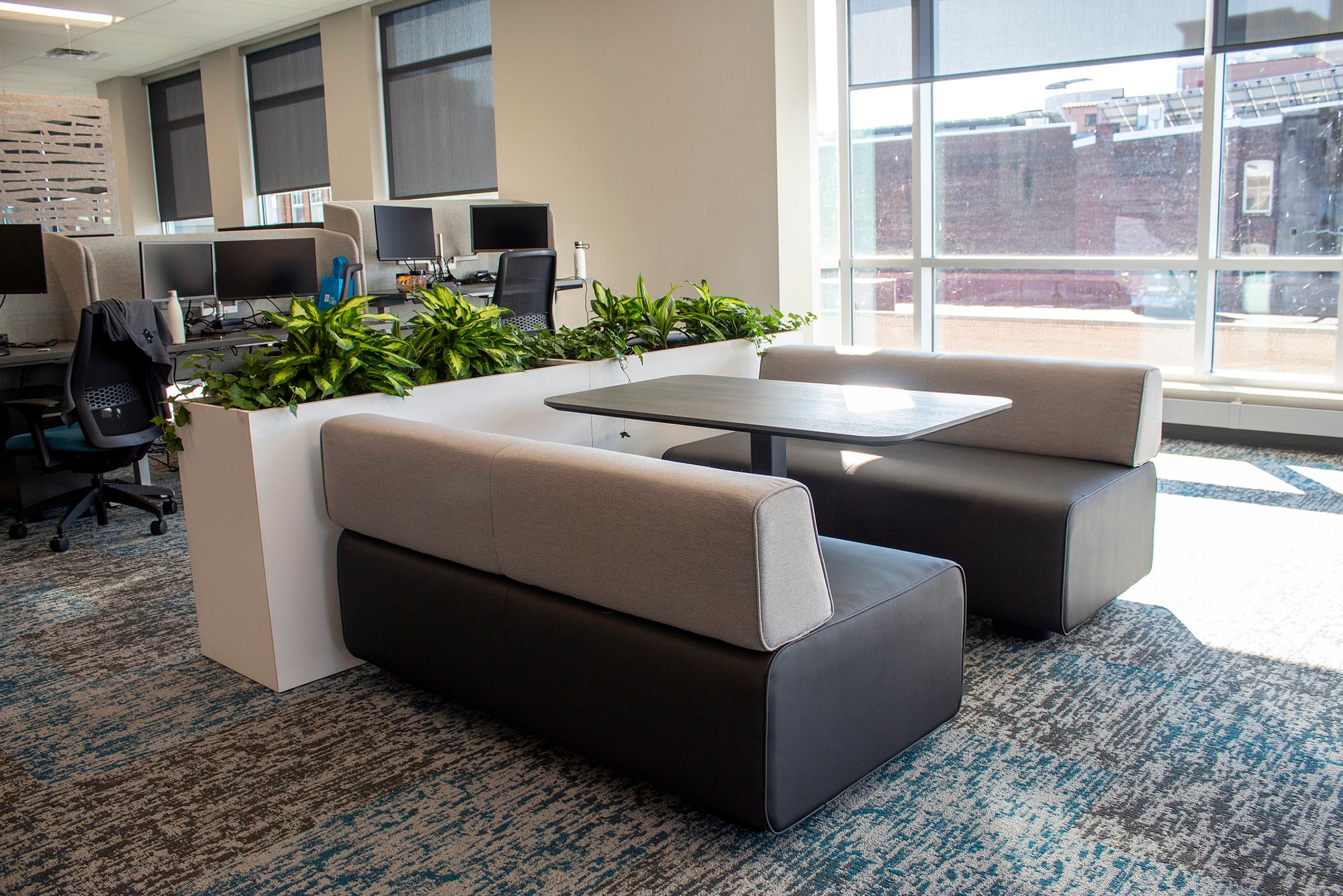 seating area with table and planters